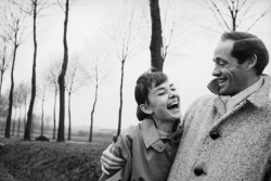 sunlightcomesfromwithin:   Audrey Hepburn and husband Mel Ferrer stop to take pictures on a country road outside Paris, 1956. Photographs by Michael Ochs.  I swear Audrey was one of the cutest humans to ever exist. 
