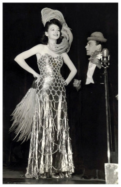 Lili St. Cyr&rsquo;s half-sister Dardy Orlando shares the burlesque stage (during a skit) with comedian Pinky Lee..