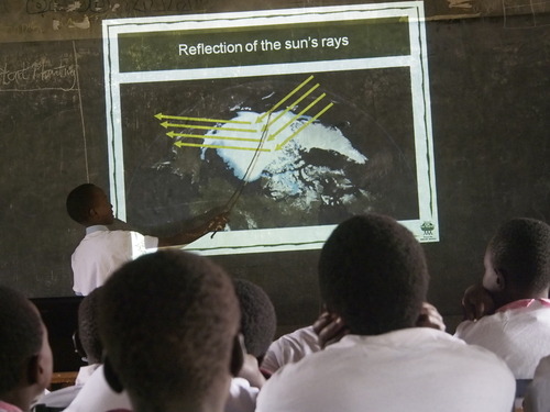 Kenyan children learning about the Grenn-House effect.