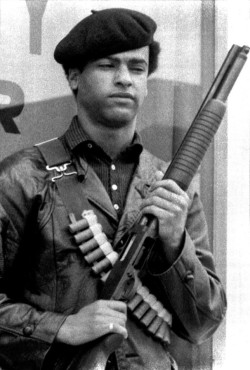jacobsgangordie:  In February of 1967, Oakland police officers stopped a car carrying Newton, Seale, and several other Panthers with rifles and handguns. When one officer asked to see one of the guns, Newton refused. “I don’t have to give you anything