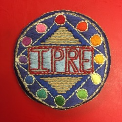 dotted-half-note: So I spent way too many hours hand-embroidering this IPRE patch. This picture doesn’t really do it justice, but boy do I love this show!