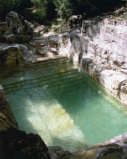 dripping-adorableness:designed-for-life: Backyard pool built into the existing limestone quarry. Love it!  Holy Jesus 