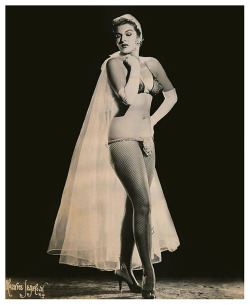 burleskateer:  Norma Arden Norma is seen here, wearing a costume detail that Dixie Evans referred to, as a: “Flipper”.. A small half-moon piece of heavy fabric belted to the waist.. A small weight was sewn into the lower-half, which Dixie suggested