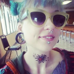 smurfasaur:  Yeah I got a sweet throat tattoo at the diner. No big deal…  Queen &lt;3!!