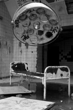 abandonthehalls:  Abandoned hospital bed. Chernobyl, Ukraine  I love creepy shit like this.