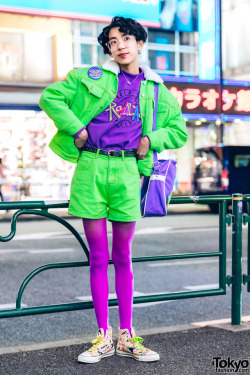 tokyo-fashion:16-year-old Japanese student Soso on the street in Harajuku wearing a colorful 1980s inspired look featuring a green denim jacket and matching shorts by Peco Club, a purple Peco Club sweatshirt and matching purple tights, Spinns high top