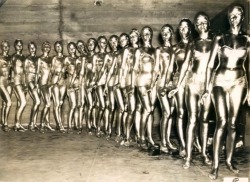 atomic-flash:  &lsquo;Los Angeles: Golden goddesses in Roman Pageant covered from head to foot with gold paint - these Hollywood dancing girls enact the roles of Roman Goddesses in a pageant in the Los Angeles Coliseum. 1936.&rsquo; (Associated News Press