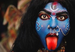 art-and-fury:  krodhavighnantaka:  CNN: A woman dressed as Hindu goddess Kali participates in a Shivaratri procession. The night is dedicated to the worship of Lord Shiva, the Hindu god of death and destruction. Kali is represented as the consort of