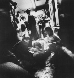 historicaltimes:  Robert F. Kennedy’s wife, Ethel, attempts to comfort him as lay mortally wounded on floor of the kitchen in the Ambassador Hotel. June 6, 1968. via reddit 