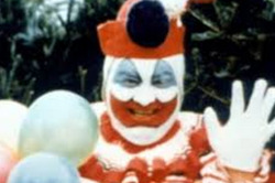 a-deliciously-hiddled-meatball:  sixpenceee:  You may never have heard of Pogo the Clown, pictured above, but when the paint comes off he was better known as John Wayne Gacy, serial killer and rapist in the 1970s. When he wasn’t appearing as a clown