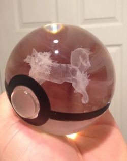 sixpenceee:  These crystal Poke Balls hold a 3D etched pokemon inside them that glows with the LED light base. From Etsy shop owner PokeMsterCrafter 