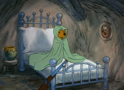 urbanfiltered:  d-i-s-n-3-y-m-a-g-i-c:  hip-hip-poohray:  Can we talk about how unbelievably adorable Winnie the Pooh is? I mean look at him all snuggled up under his blanket for safety!   Why has he got rifle?  to keep away the heffalumps and woozles