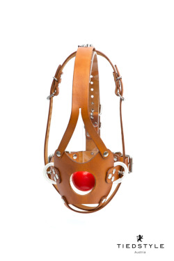 tiedstyle:   Panel / muzzle gag with a leather front panel for additional  inflatable gags. Full adjustable. Leather hand dyed. All leather edges  polished.With a removable silicone ball gag.  Handmade by TIEDSTYLE  
