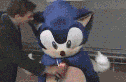 suppermariobroth:Mario disrupts Sonic’s interview in one of the promotional videos for Mario &amp; Sonic at the Olympic Games.