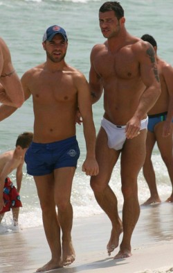 stratisxx:  I remember this pic from my old blog. This hot guy at Elia beach Mykonos was over 6'5 feet tall. His cock was xlarge and his speedos see -through.  He could have knocked out that little guy with that swinging  big dick.  If I recall he took