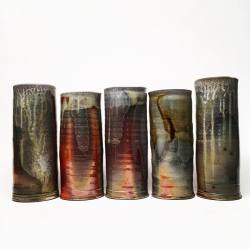 jrothshank:  Five wood fired vases.  Awesome!  They&rsquo;re organic, yet industrial.