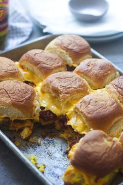 food-for-comfort:  Cheesy Mexican Breakfast Sliders   Soft scrambled eggs, spicy chorizo and gooey American cheese are layered between Hawaiian buns for the perfect crowd-pleasing breakfast!  