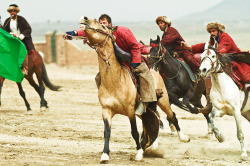 equine-awareness: micandragon:   themotherfuckingclickerkid:  equine-awareness:  ghasedakk:    Buzkashi (literally “goat dragging” in Persian) or kokpar is the Central Asian sport in which horse-mounted players attempt to drag a goat or calf carcass