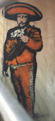 mexandthecity:  IRIS:  La Mona Lisa as a Mariachi is a work of genius. Hidden behind a gated alleyway on Metropolitan near Union ave in Williamsburg. Anyone know the artist?