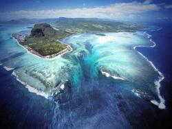 earthstory:   When the Ocean Fell into the Ocean: Ancient Continents &amp; Underwater Waterfalls  Let’s go somewhere where the ocean falls into itself; somewhere small with a big history and a big story to tell. Mauritius Island, which sits about 900