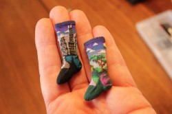 superslyskillzmcfly:  These little socks were made by Althea Crome, the person who knitted the clothes for the movie Coraline. These socks have 70 stitches per inch and represent her  childhood in Chicago and the scenic trip out of Chicago to Bloomington.