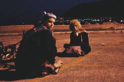 givemeacid:  coltre:  This is a picture I took of my friends in a vacant parking lot last year. We spent part of the night there near the sea, talking and laughing without thinking about the future, looking at the lights of the city in front of us. I