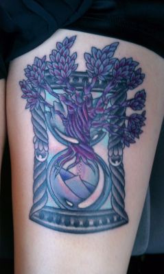 fuckyeahtattoos:  This tattoo was done in Corpus Christi, Tx by Cindy Saenz at Electra Art. This is my hourglass with the tree of life breaking through the top, done on my front left thigh. It has so much meaning to me and I could not be happier with