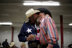 enoughtohold:Gordon Satterly, 61, from Michigan (L) kisses his husband Richard Brand, 53, from Texas, at the International Gay Rodeo Association’s Rodeo In the Rock party in Little Rock, Arkansas, April 24, 2015. Photo by Lucy Nicholson/Reuters I don’t