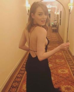 Emma Stone walking to your hotel room.