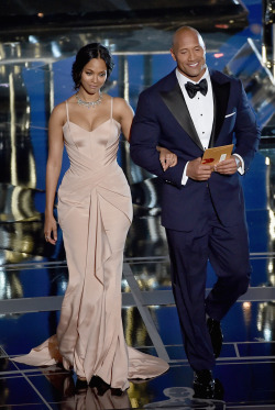 calitrophywife:moneyandsins:celebritiesofcolor:Zoe Saldana and Dwayne Johnson speak onstage during the 87th Annual Academy Awards at Dolby Theatre on February 22, 2015 in Hollywood, California.  I can’t handle all the sexiness in this photo  Both are