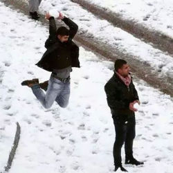 generation-something: charlesoberonn:  This image is way funnier considering that this is Egypt and this snow was the first snow they got in 112 years.  this man has waited 112 years to SLAM DUNK that snowball on this man’s head 
