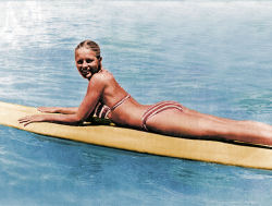 Cheryl Ladd in a bikini on a surfboard. It doesn&rsquo;t get more American than this, folks. Have cool summer weekend!