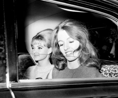 Christine Keeler, right, and Mandy Rice-Davies leaving the Old Bailey after the conclusion of the fist day’s hearing of the trial at the Old Bailey in which Dr. Stephen Ward, 50 year old osteopath faces vice charges. Nudes &amp; Noises  