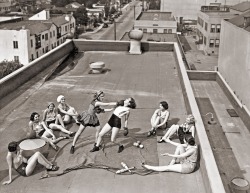 Women boxing on a roof, 1938.