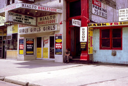 Press photo dated from the mid-70’s features a decidedly seedy view on the &lsquo;RIALTO Theatre&rsquo; in Chicago.. By this time, classic Burlesque had all but disappeared; with most venues converting to porno theatres to survive..