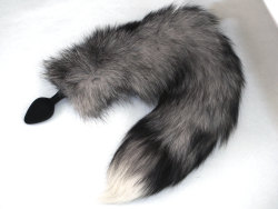 leatherlacedbass:  thespankacademy:  One of our absolute best sellers!  This beauty has a detachable blinged-out silicon jeweled plug, in 2 sizes :)21” white-tipped REAL silver Indigo fox fur tail ^_^ This tail is so much fun because you can wear the