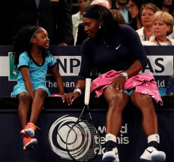 soph-okonedo:    Serena Williams speaks to a young fan on the bench as she plays Caroline Wozniacki during the BNP Paribas Showdown at Madison Square Garden on March 8, 2016 in New York City   