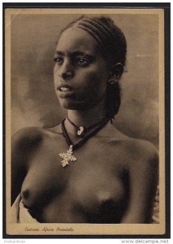 Eritrean woman, via Delcampe.   