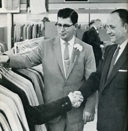 At the opening of a new Robert Hall store in Memphis, a size-39 suit helps sell itself.