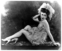 Jenne Lee is featured in a publicity photo from Duke Goldstone’s 1949 Burlesque film: “HOLLYWOOD BURLESQUE”.. Essentially a documentary recording of a complete Burlesque show,— it was filmed at the ‘HOLLYWOOD Theatre’; located in San Diego,