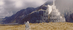 areddhels:  Today in Middle-Earth: Gandalf and Pippin reach Minas Tirith (March 9th, 3019 T.A.)  And there where the White Mountains of Ered Nimrais came to their end he saw, as Gandalf had promised, the dark mass of Mount Mindolluin, the deep purple