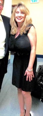 funbaggery:Much too much😍 that custom made underwire bra straining through her little black dress behind the weight of those huge heavy mamms.