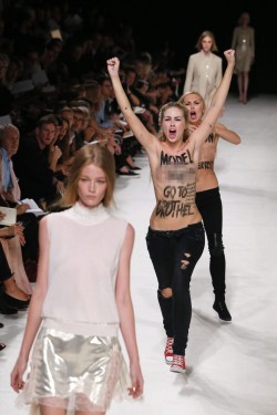 marionjravenwood:  kateifer:   nationalpost: &lsquo;I wish I’d pushed them off the stage&rsquo;: Model furious after topless protesters 'ruin&rsquo; Paris fashion show The biggest shock of Paris’s spring-summer 2014 fashion shows came on the otherwise
