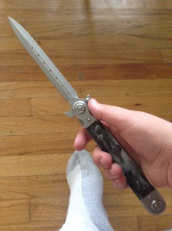 I won this knife at an arcade today in Myrtle Beach.I hit the jackpot on a huge ball dropper game, and won about 1250 tickets. I had a few more and got this thing at 1200 tickets. Its HUGE! And I freaking love it. 