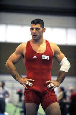singlets:  gearessentials:  ocfreeballers:  olympian wrestler and cock.  Again. Love, LOVE LOVE a singlet—and pulling it off! Get yours (assless)!  http://gearessentials.com/collections/cockrings/products/double-nitrile-cock-ring   See also on Tumbler
