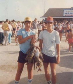 133.Â  There was a time when guys actually wore real shorts every day.Â  Look in the background too.