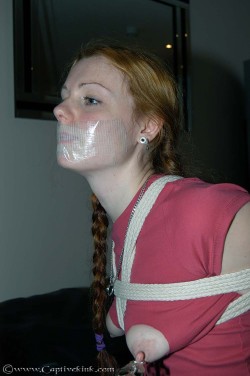 gagged4life:  You just don’t see clear duct tape that much these days, so it’s always nice when it shows up in photos or videos as a gag.