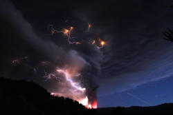 Lightning bolts strike around the Puyehue-Cordon Caulle volcanic chain near southern Osorno city June 5, 2011. The volcano in the Puyehue-Cordon Caulle chain, dormant for decades, erupted in south-central Chile on Saturday, belching ash over 6 miles (10