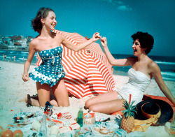 vintagegal:  Two friends celebrate Christmas at Bondi Beach, Australia,1959 (via) 