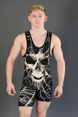 piledriveu:  If you wanna be knows as an alpha in the ring, some simple rules to follow……get a cool singlet, like the one above……Always manspread your legs nice and wide while lacing your boots…..Always find a reason to show off your chest…….Never